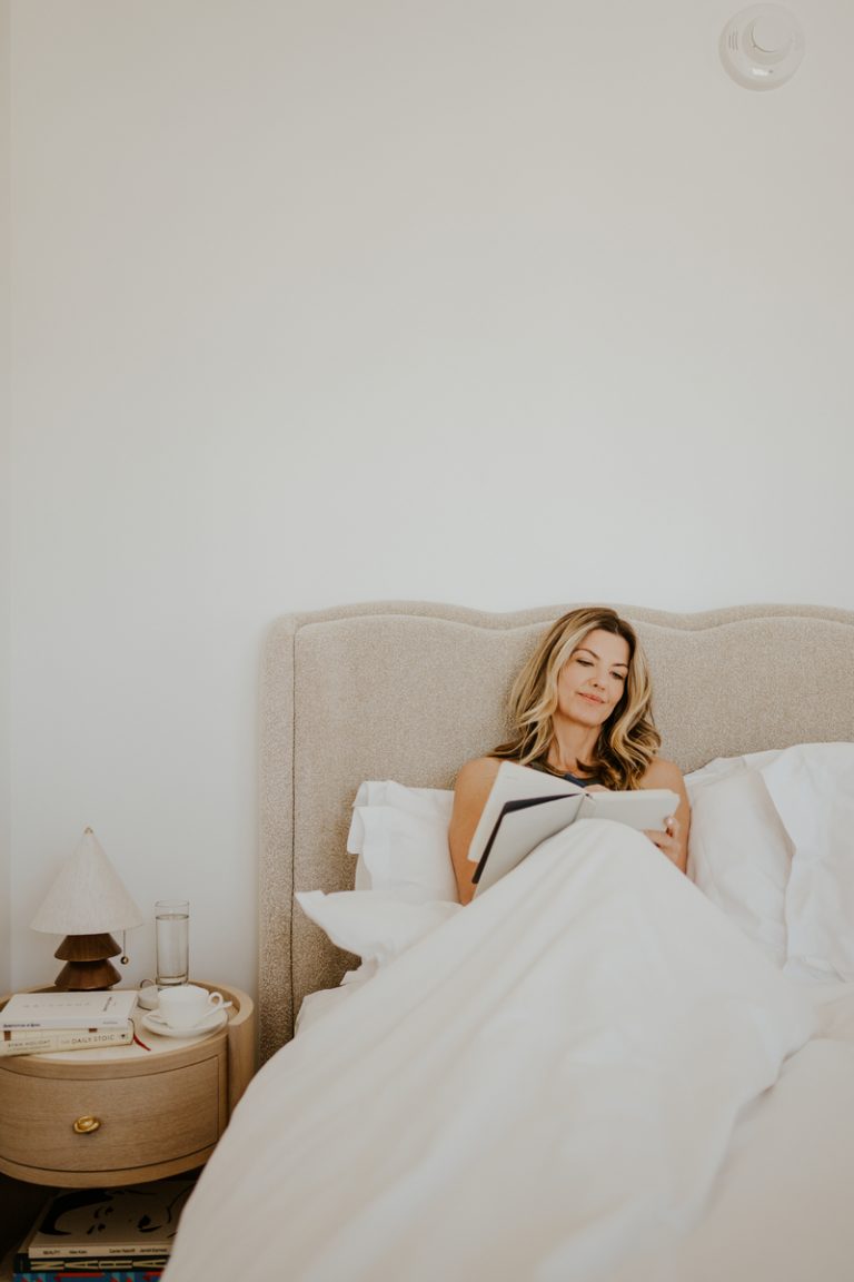 woman journaling in bed lemon ginger tea benefits