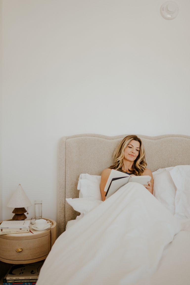 woman reading in bed