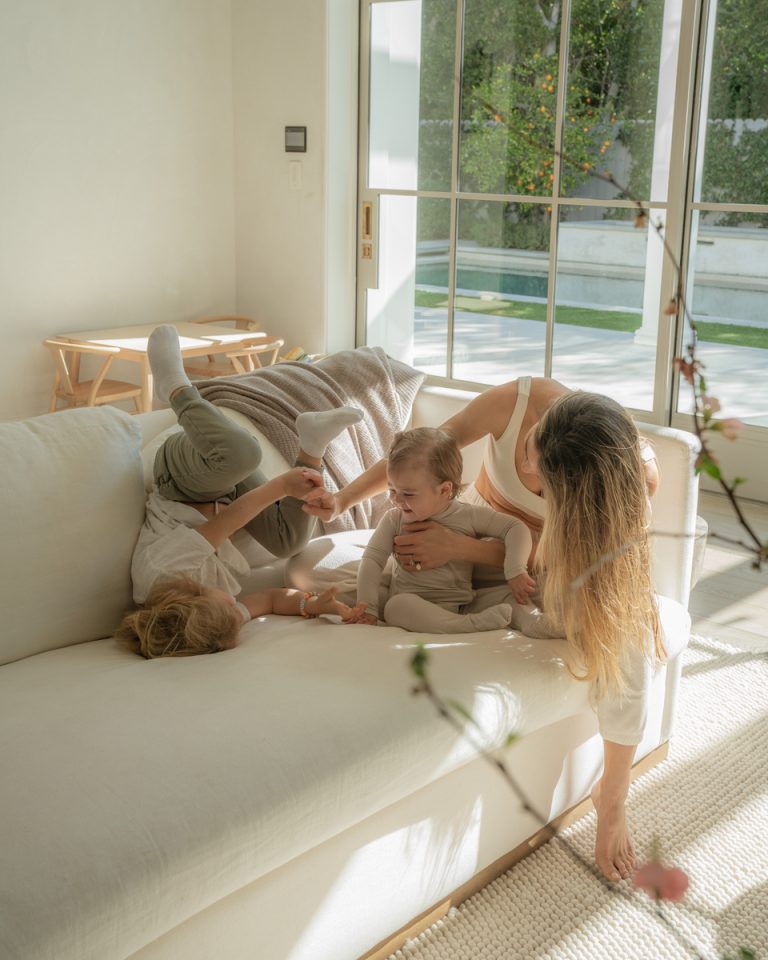 woman playing with family 