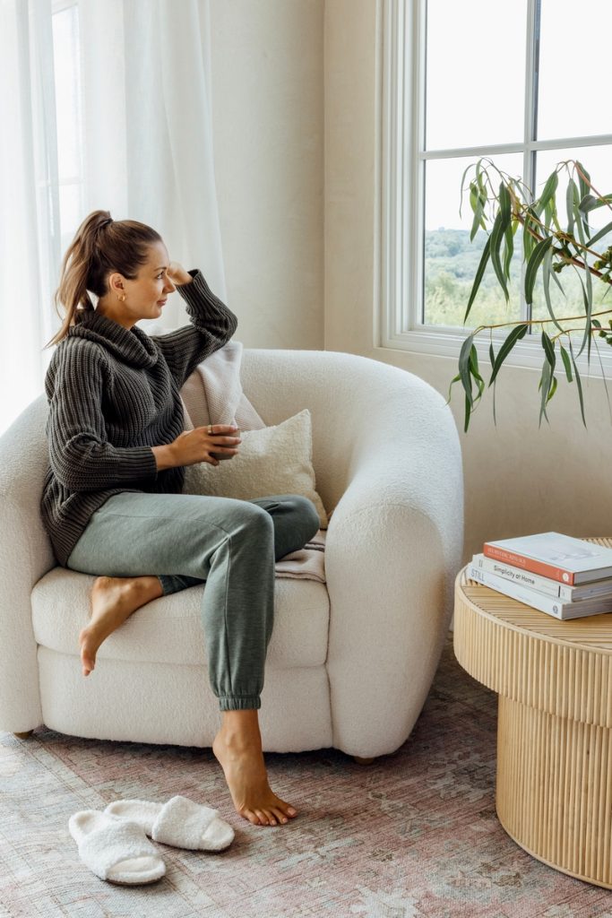 woman wearing loungewear in cozy chair