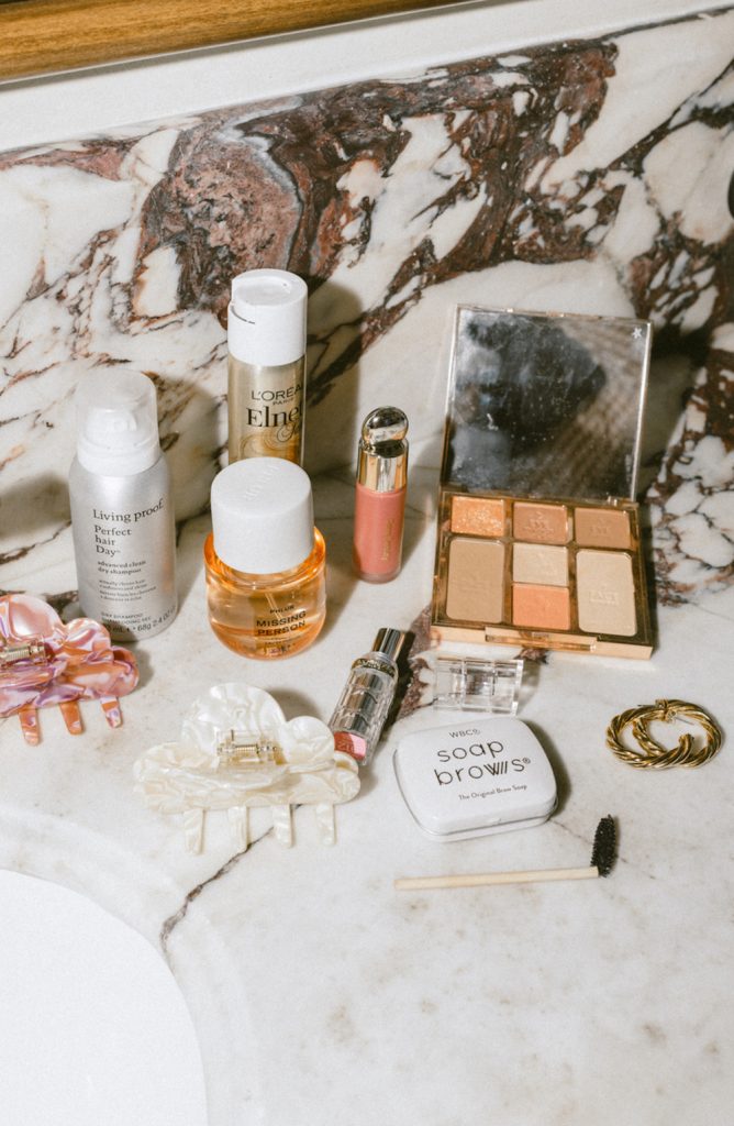 makeup and skincare products on bathroom counter