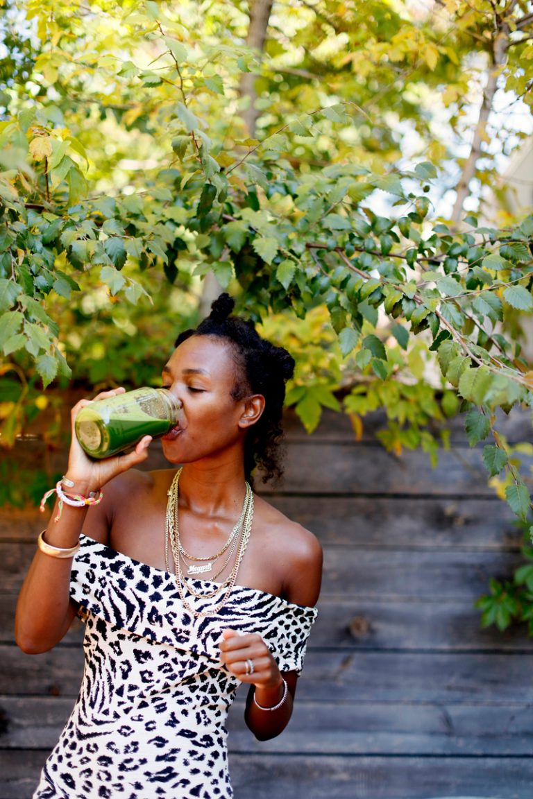 Woman drinking green juice Far infrared sauna Health effect