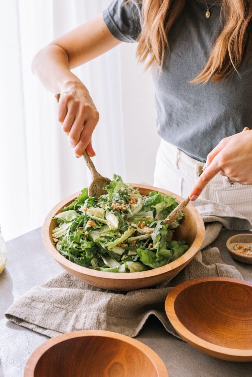 Tossing simple green salad recipe.