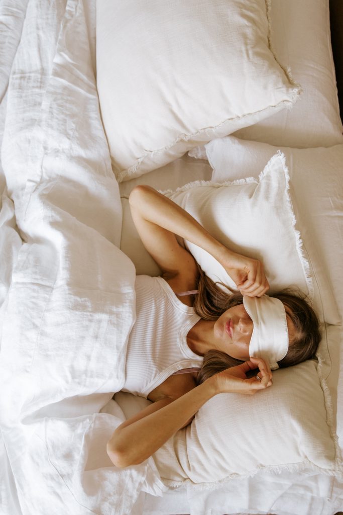 woman sleeping eye mask how to reduce inflammation
