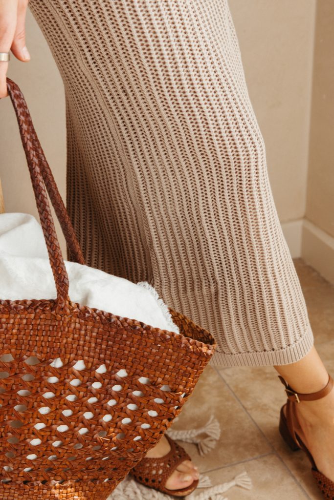 crochet dress and woven bag