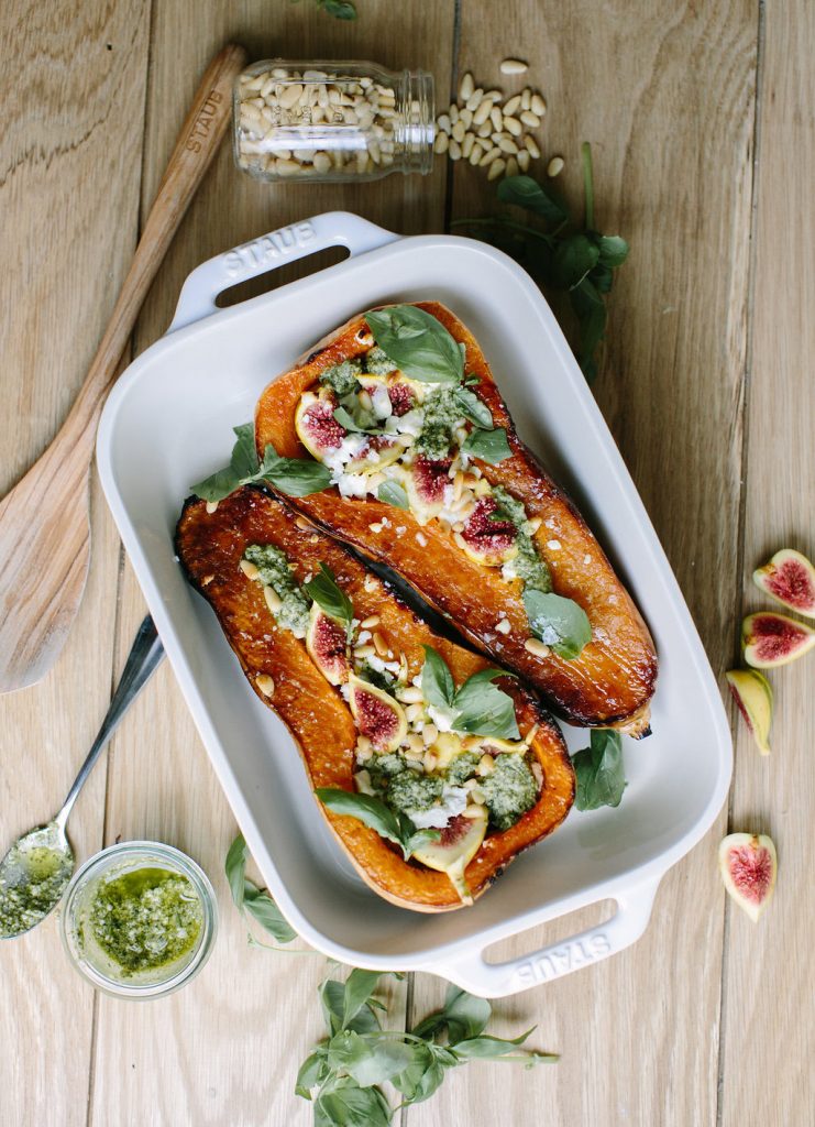 Roasted butternut squash stuffed with goat cheese, figs and pesto