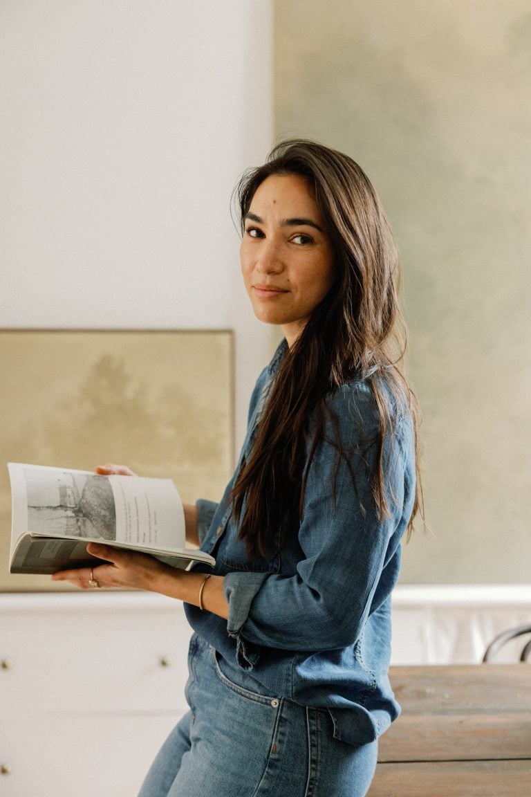 woman holding a book, how to listen