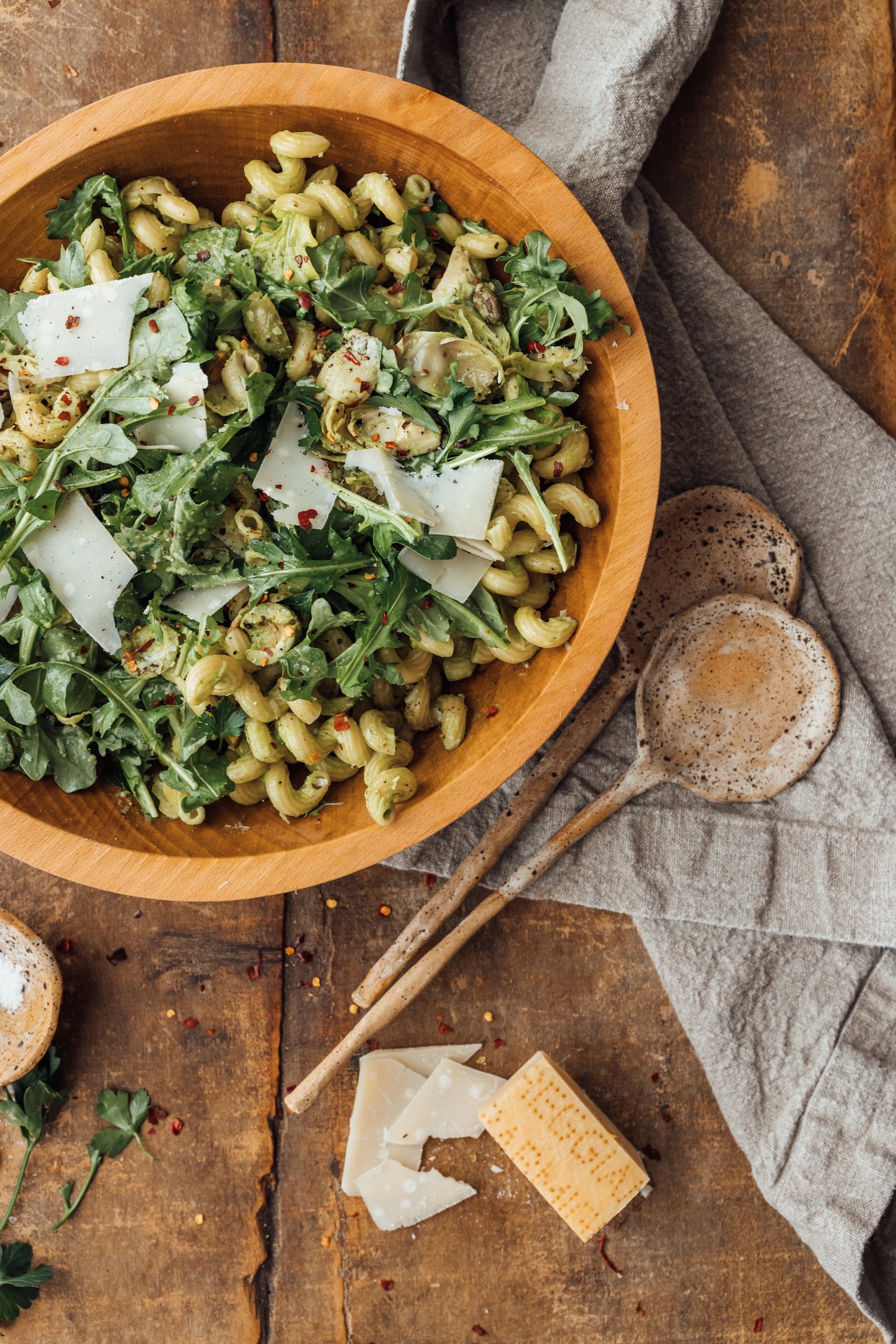 Spring pasta salad with olives, lemons and artichokes