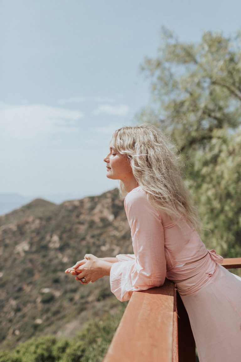 woman with her face in the sun, mindful weight loss