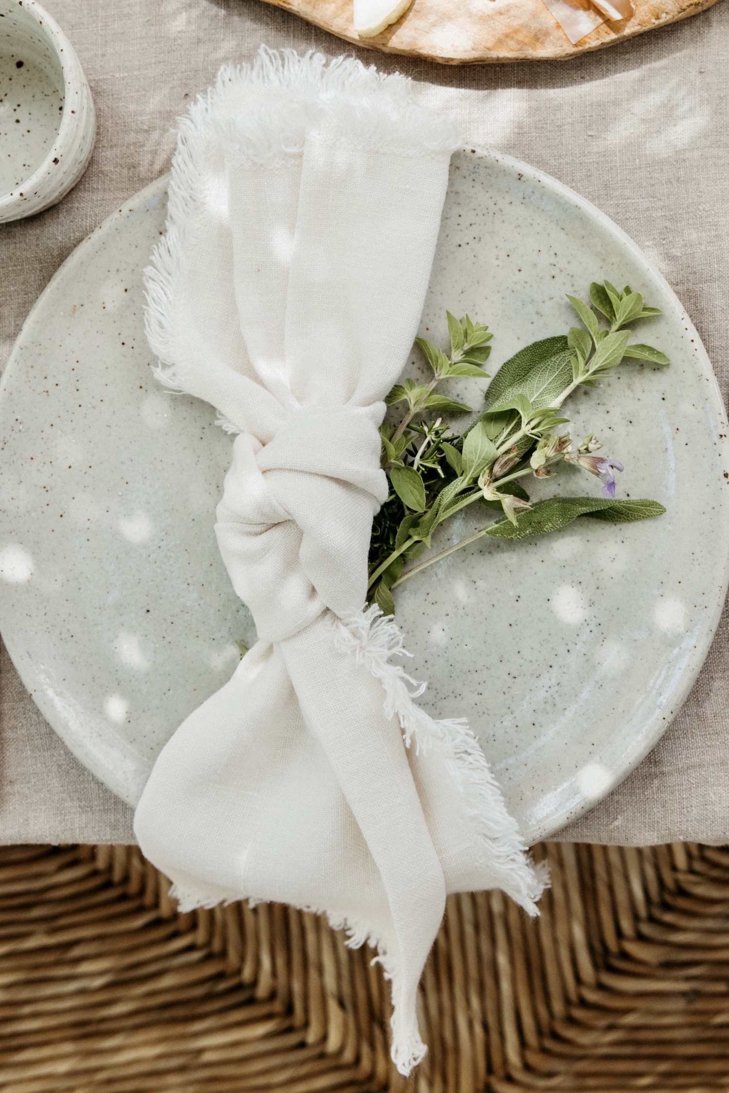how to knot a linen napkin, herbs, mother's day table decorations