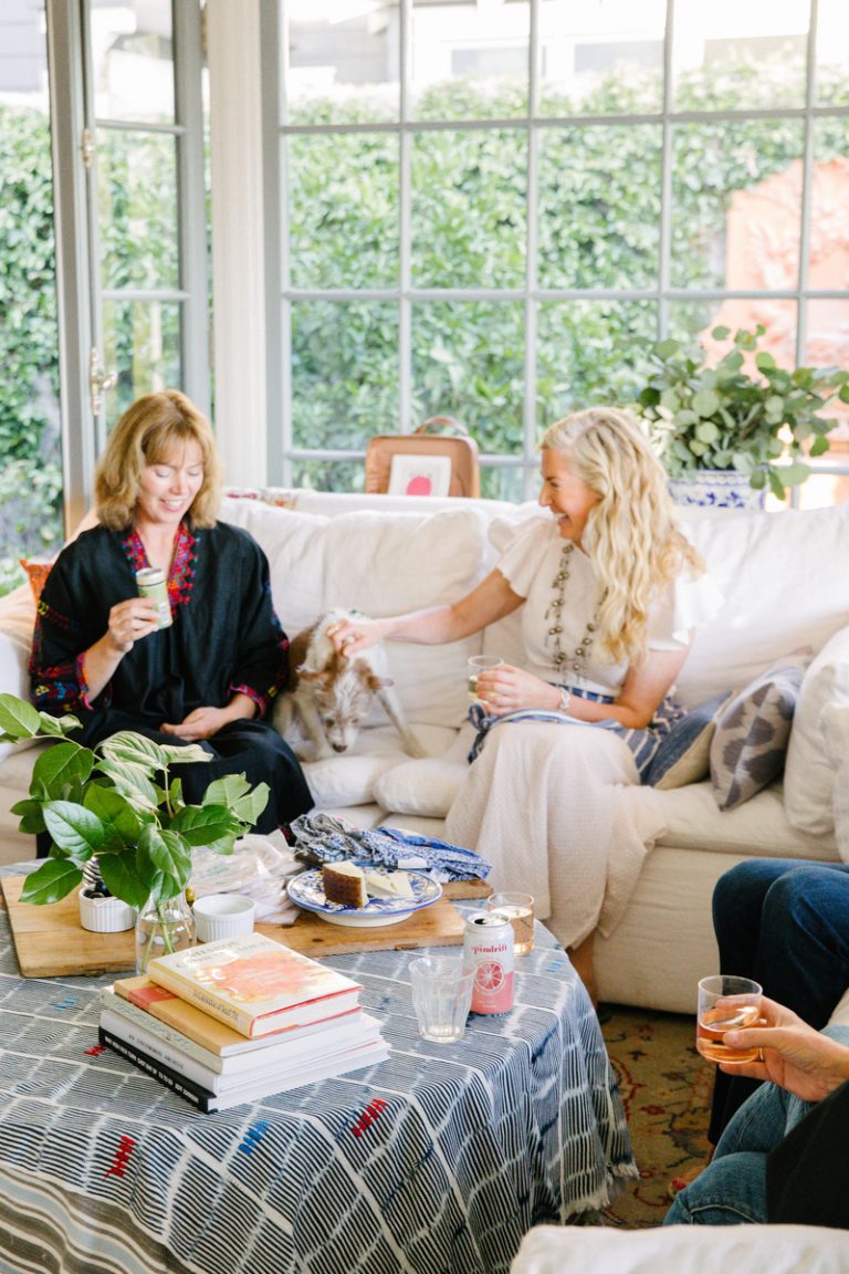 Chatting on the couch, adult siblings