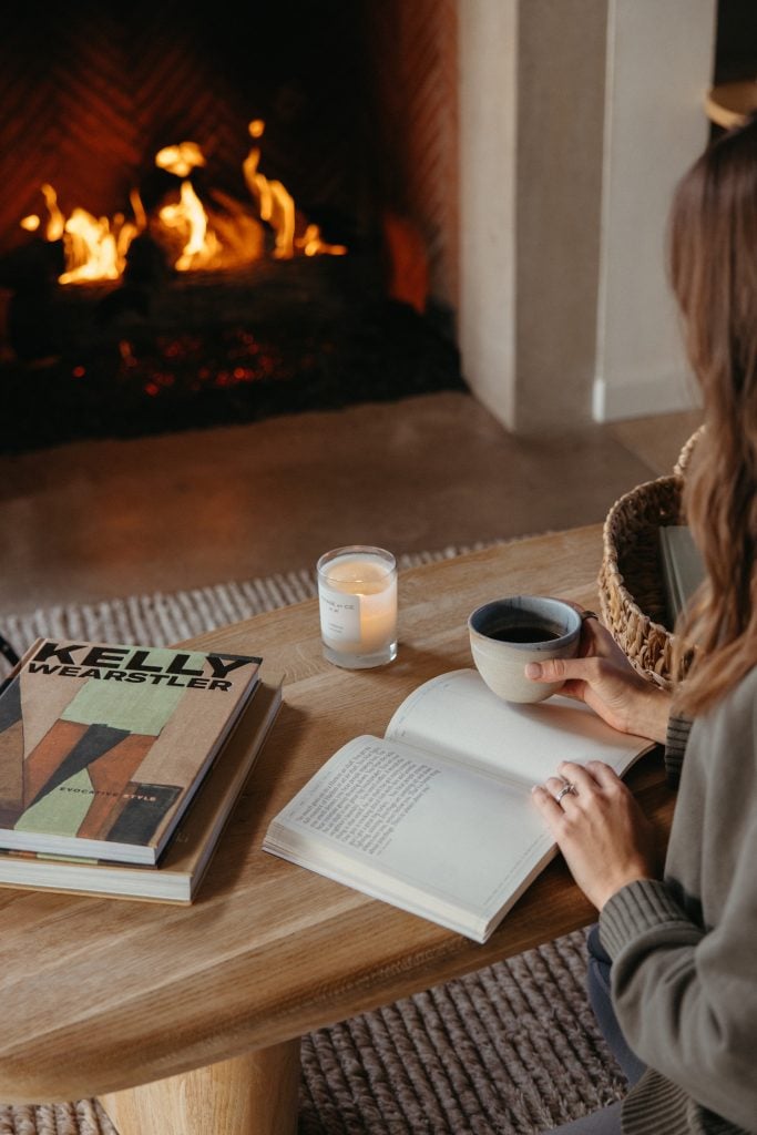 drinking coffee and reading by fireplace, caffeine and estrogen