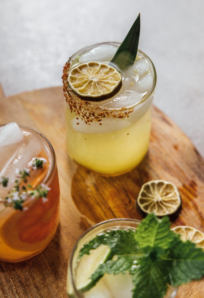 pineapple leaf and dehydrated lime in spicy kombucha margarita