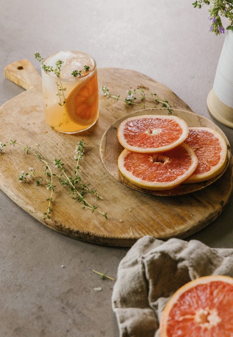 grapefruit slices and a kombucha grapefruit paloma cocktail