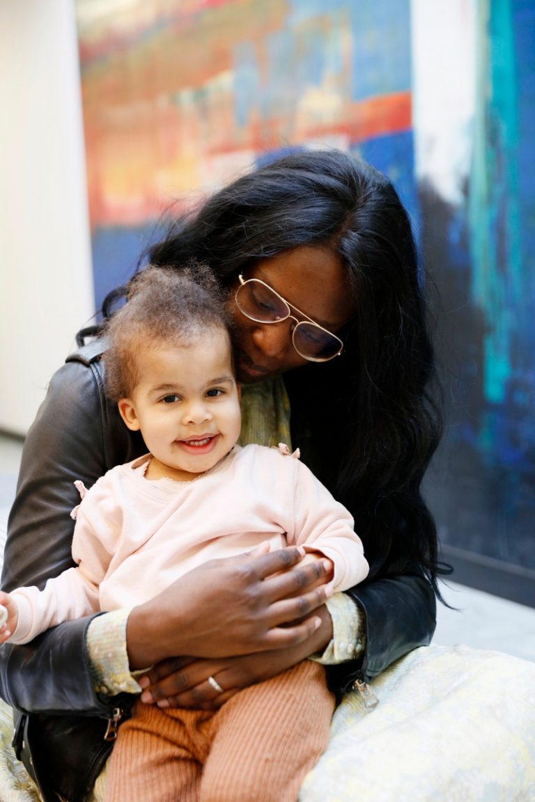 woman holding baby