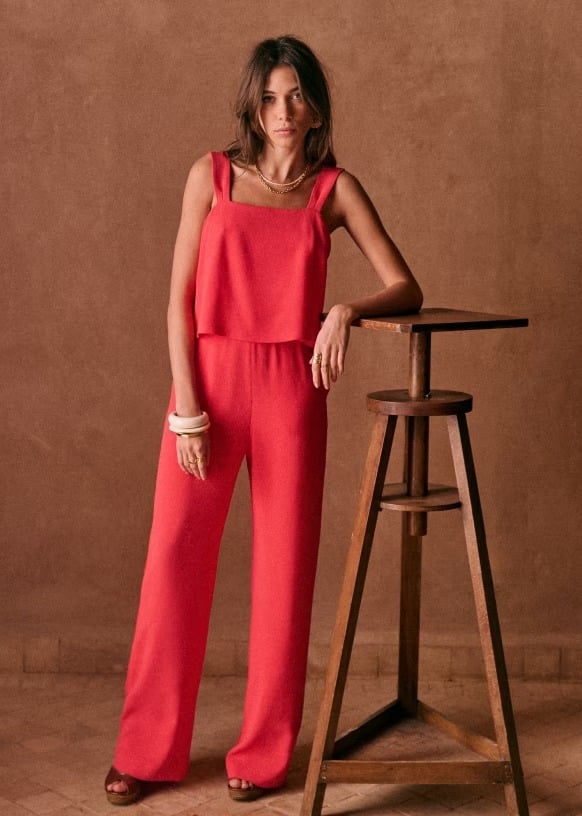 woman wearing pink sezane jumpsuit