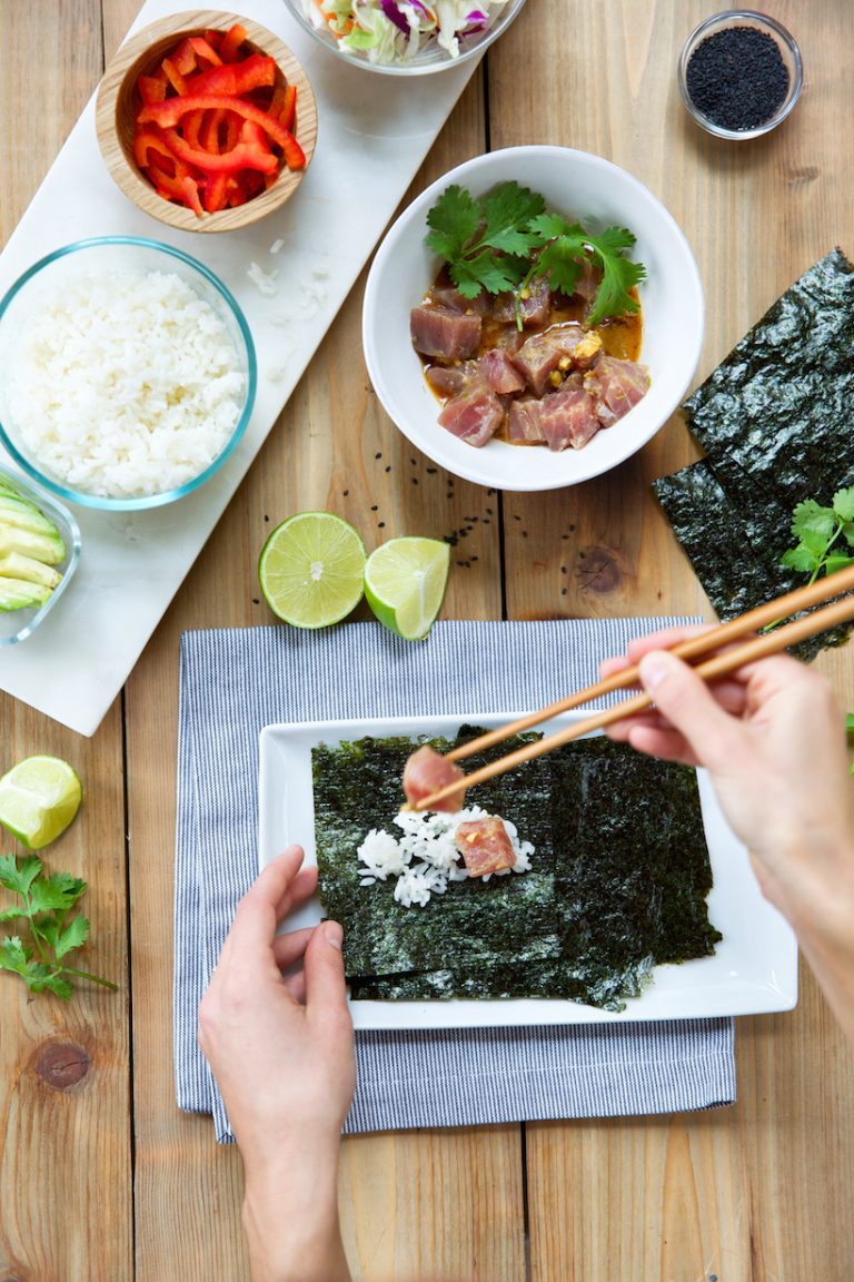 Assembly of seaweed hand rolls.