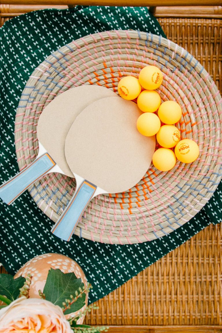 table tennis paddle and ball