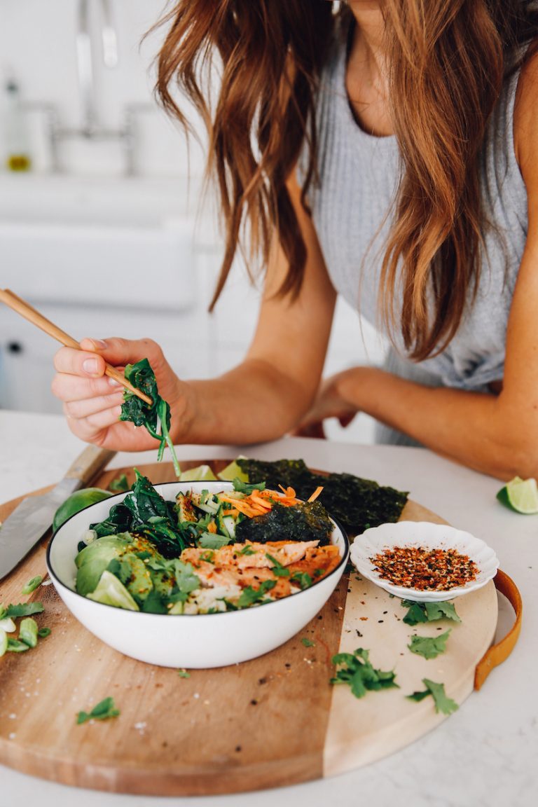 Salmon roll sushi bowl with nori.