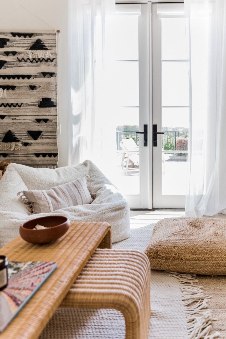 French doors with white gauzy curtains.