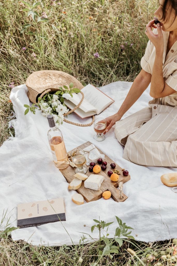 aesthetic picnic set up in wildflower field