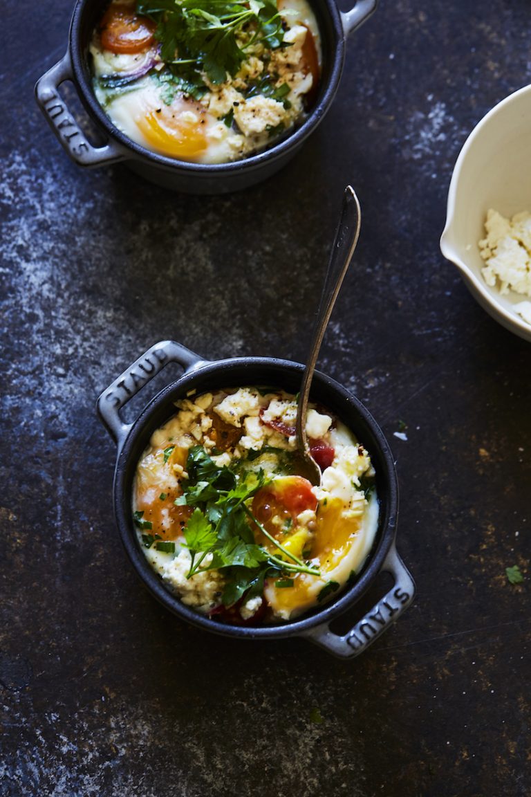 baked eggs with heirloom tomatoes, herbs, and feta