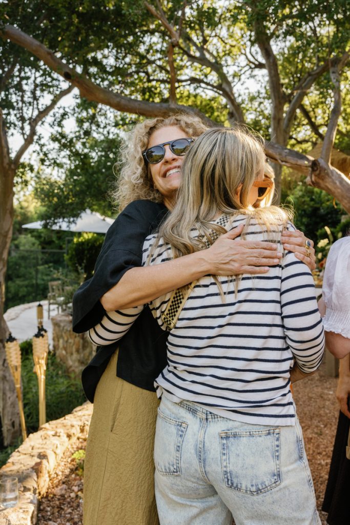 friends greeting each other at apero