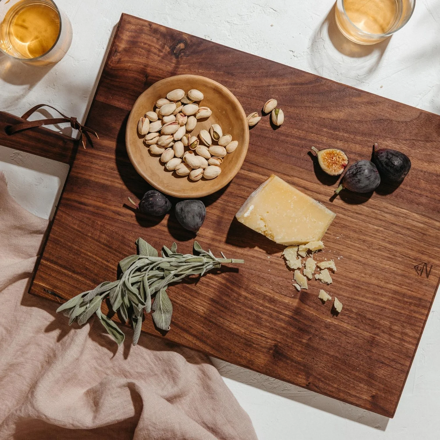Casa Zuma Large Wooden Gathering Board with nuts and herbs