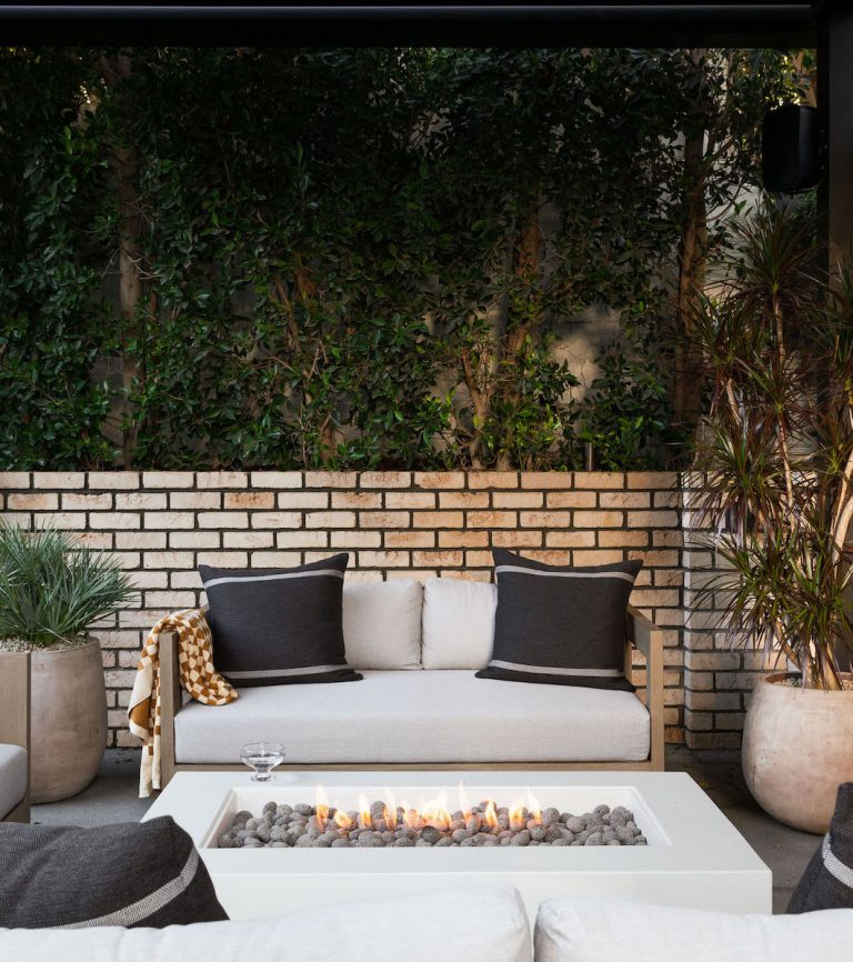 Modern outdoor fire pit with sofas