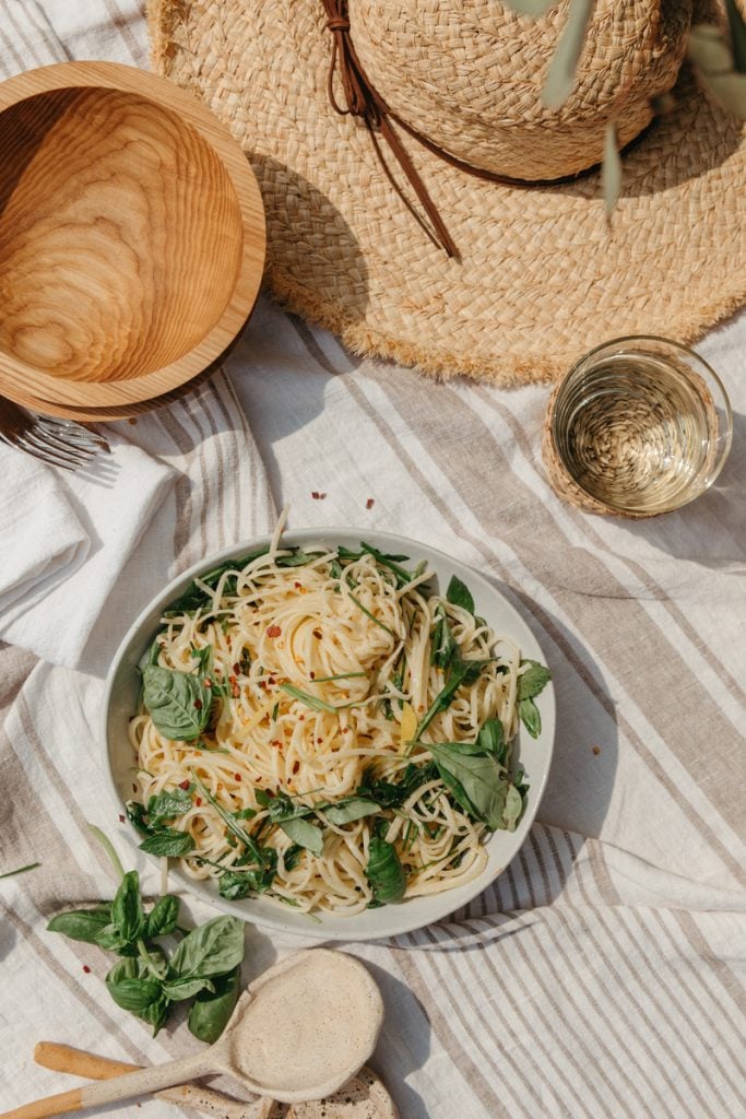 pasta bowl on beach blanket—beach picnic recipes