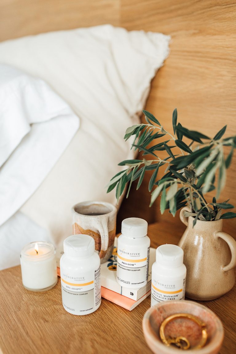 Supplements on a nightstand.