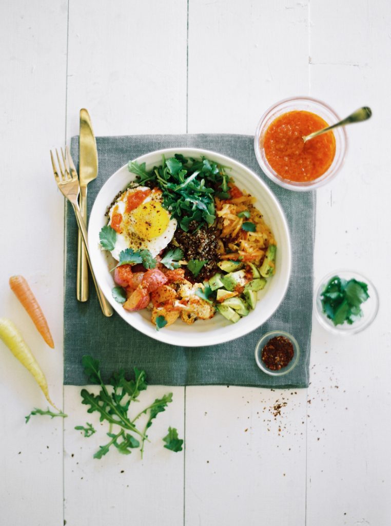 Quinoa Bowl With Harissa Roasted Veggies, Avocado, & Fried Egg