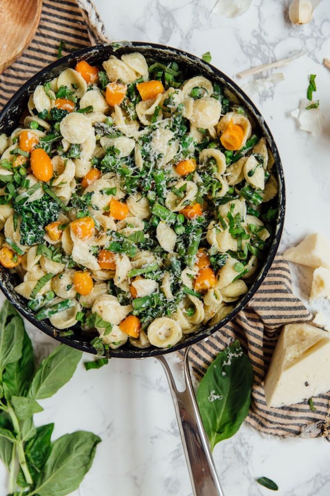 One-pot pasta primavera with summer vegetables and ricotta cheese