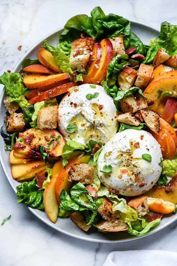 peach panzanella salad with burrata and bacon