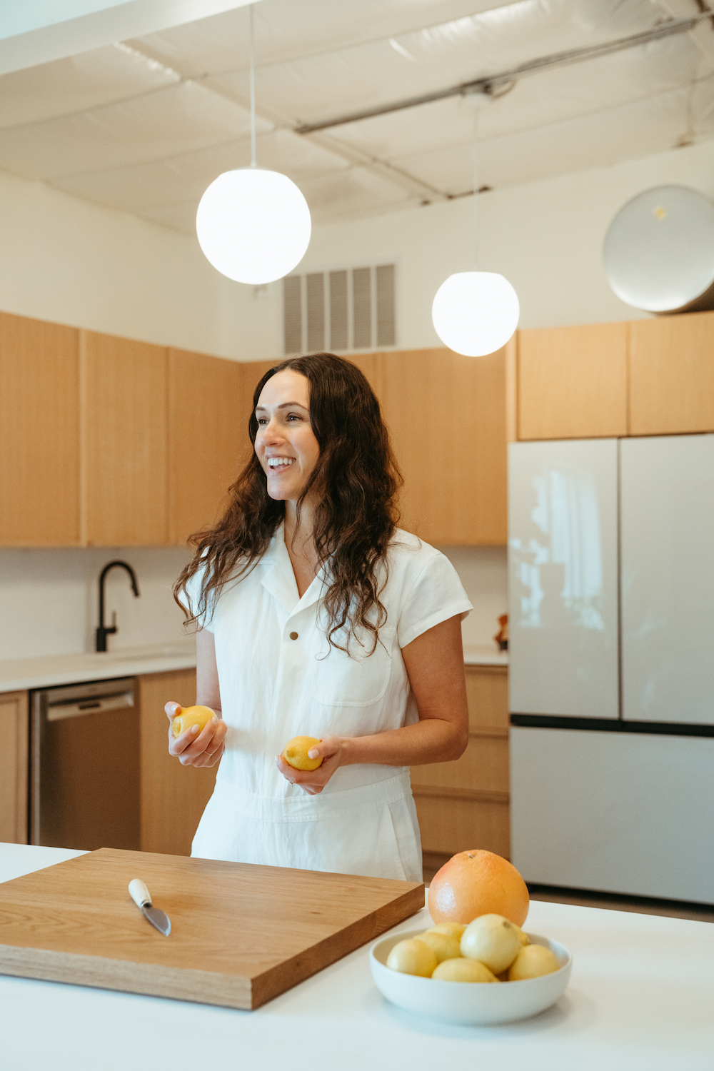 Adriene Mishler in kitchen.