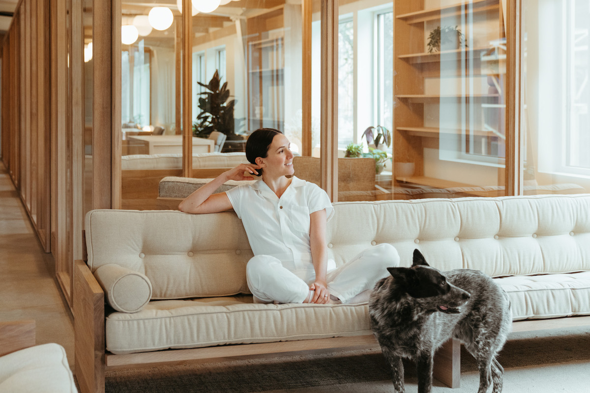 Adriene Mishler sitting on couch in her Austin, Texas office.