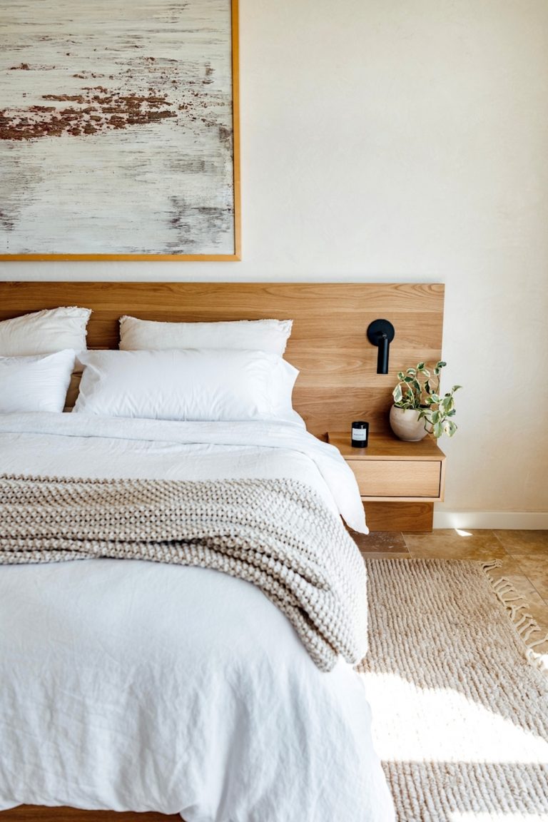 Minimalist, neutral-colored bedroom.
