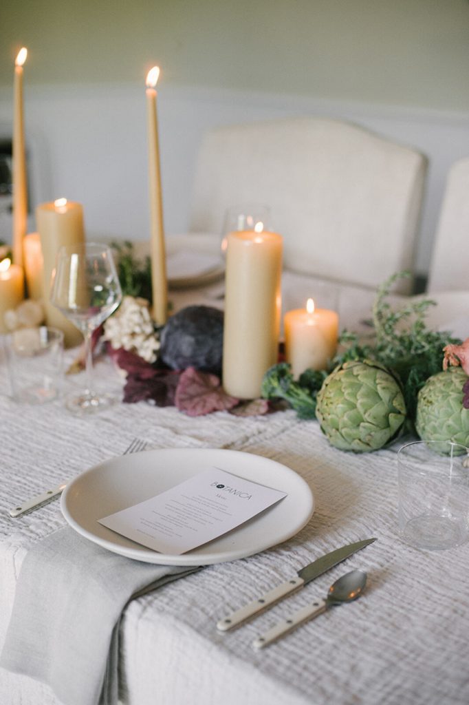 Modern neutral dinner table setting.