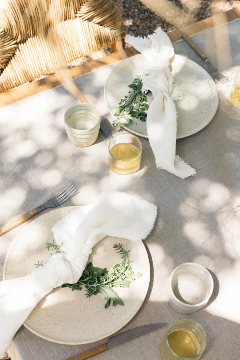 Neutral outdoor table setting.