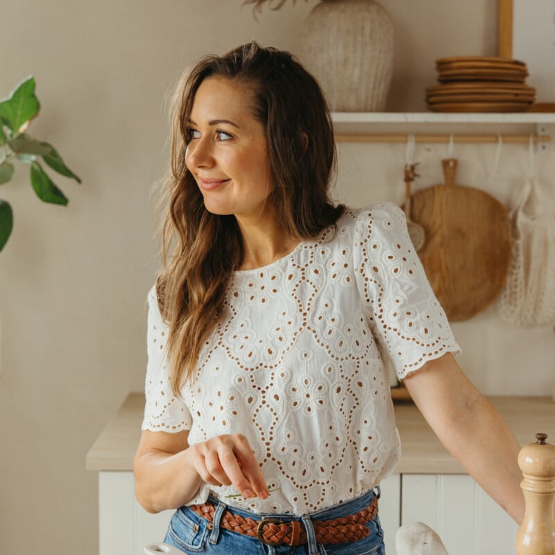 woman standing in kitchen with fritatta