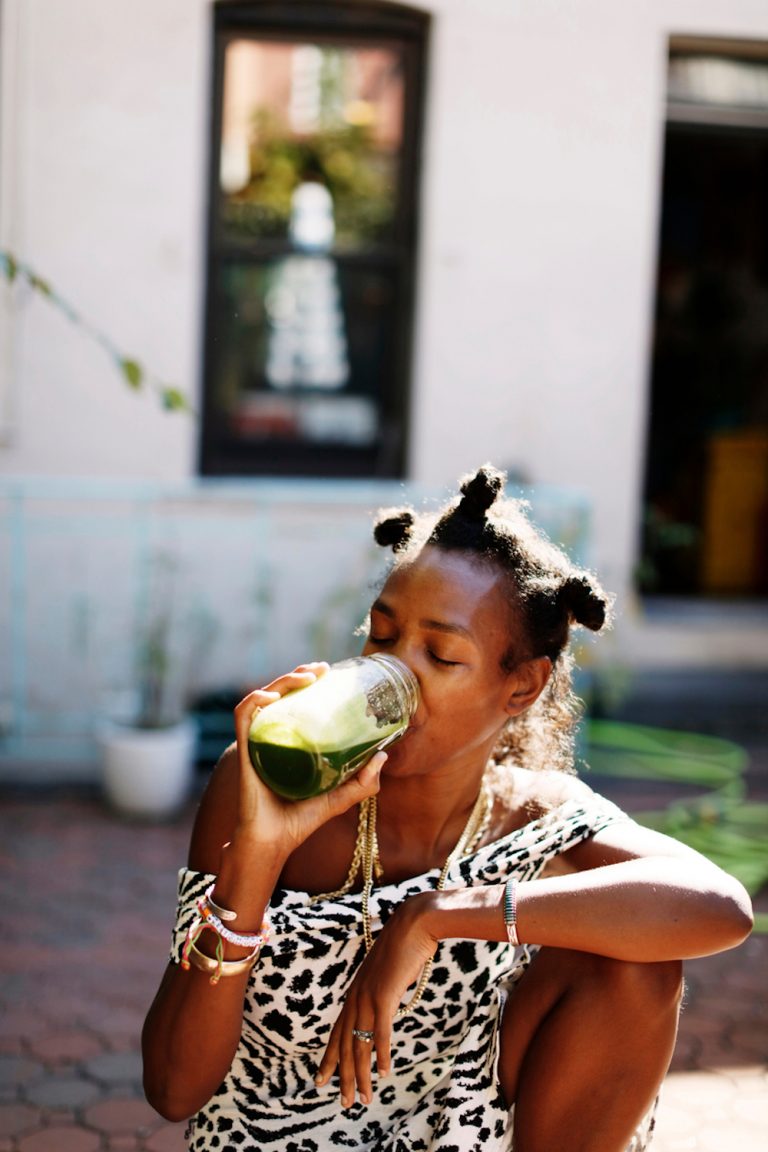 Megan O'Neill drinking green juice.