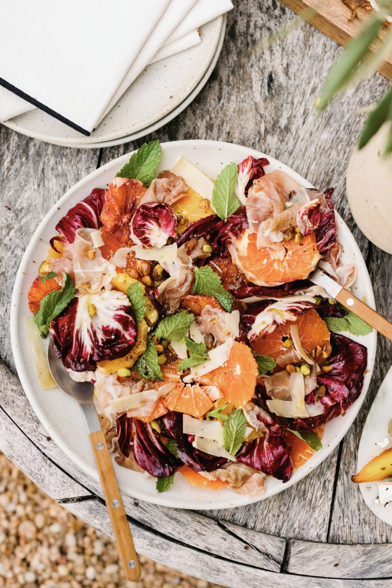 bitter greens, citrus, and prosciutto salad