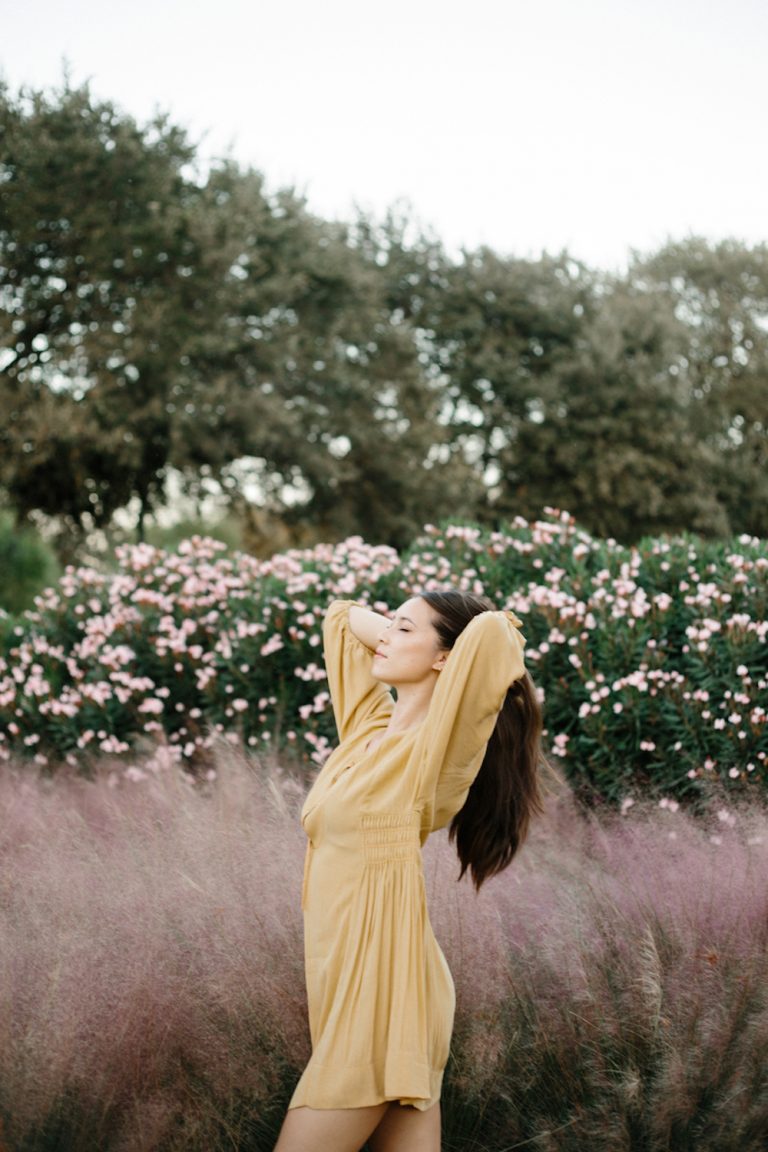 Woman standing outside.