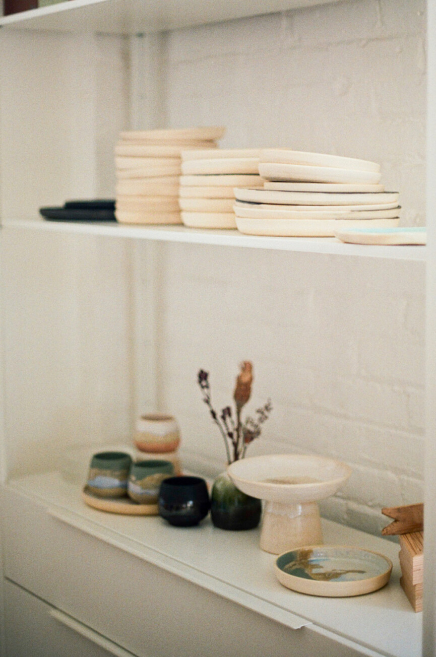 Ceramics on a shelf.