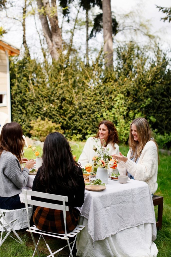 Women eating a meal outside.