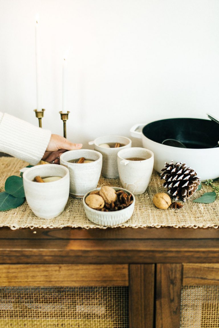 Mugs of hot cider.