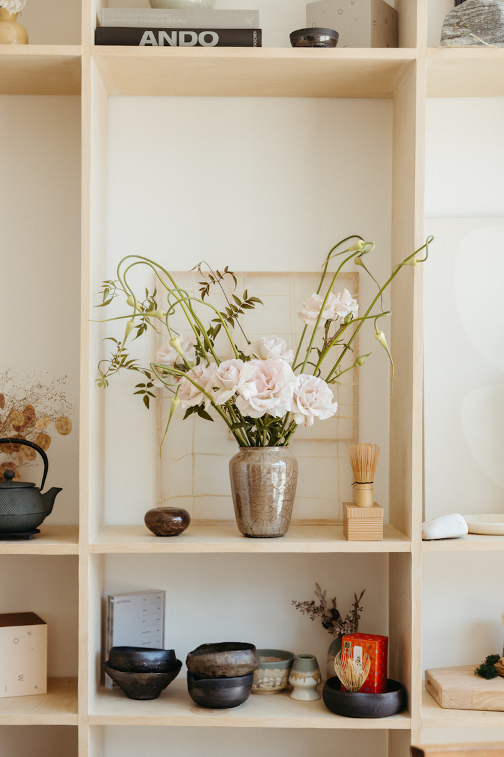 Shelf with flowers.