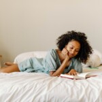 Woman reading in bed.