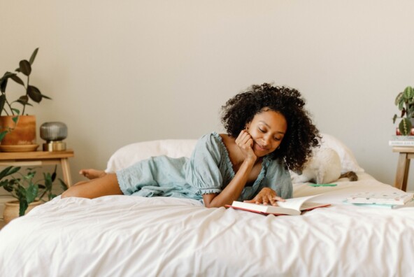 Woman reading in bed.