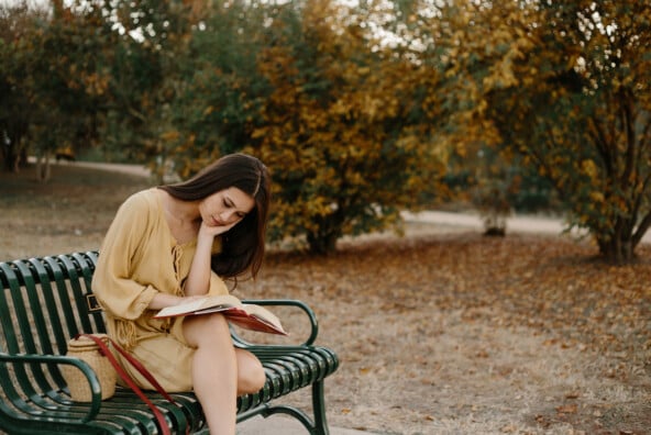 Woman reading outside.